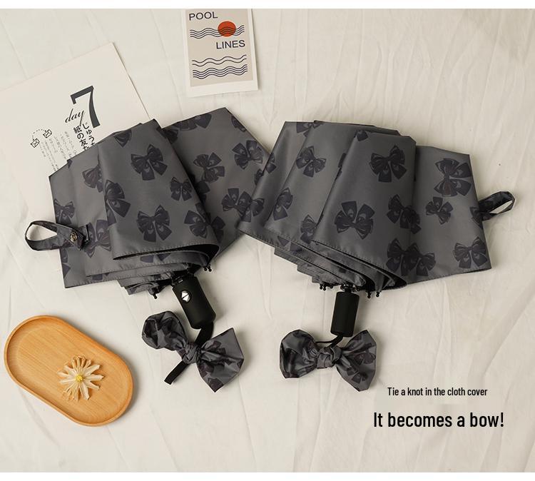 Women's Bow Sun & Rain Dual-Use Automatic Folding Umbrella - Compact, Fresh Sunshade with Black Glue for Sunscreen Protection.