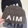 Contrasting large letters Elastic thin age reducing pile hat Children autumn and winter warm versatile Internet celebrity wool hat Knitted hat