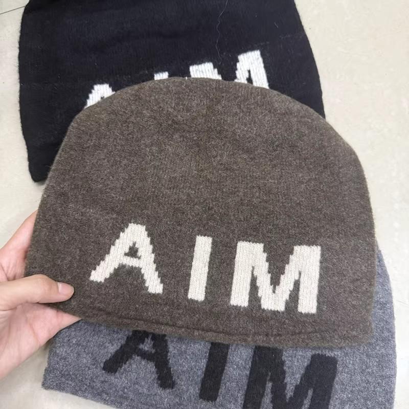 Contrasting large letters Elastic thin age reducing pile hat Children autumn and winter warm versatile Internet celebrity wool hat Knitted hat