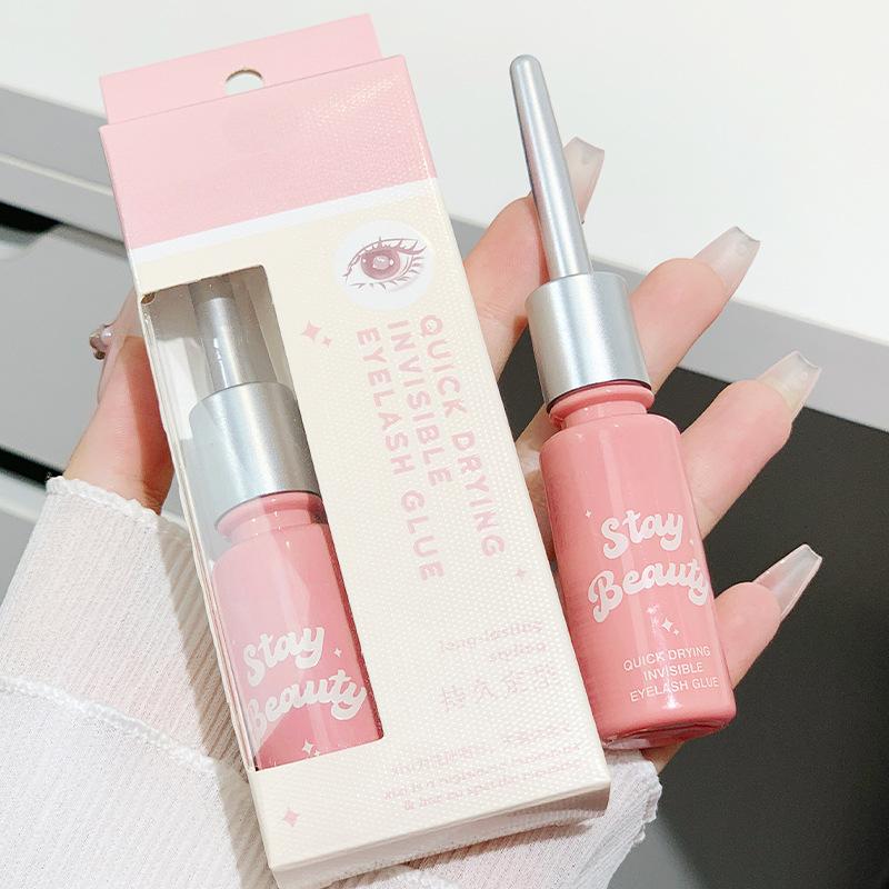 Künstlicher Wimpernkleber ist ein langanhaltendes, sanftes und nicht reizendes Styling-Hilfsmittel für die Schönheit