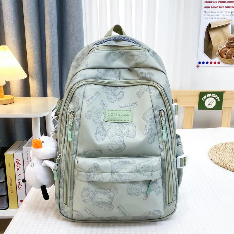 School bag for female junior high school students, simple and versatile printed bear niche design, college student computer backpack tide