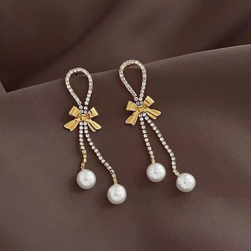 New temperament bow tassel pearl earrings feminine light luxury temperament long earrings earrings золотой