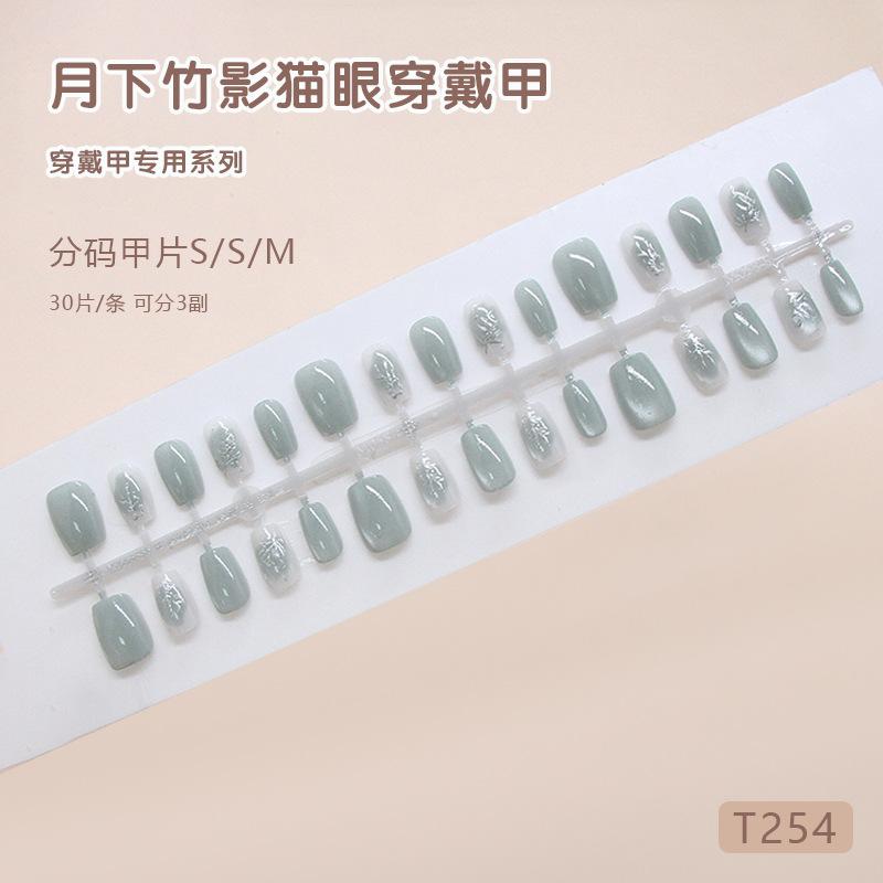 

Ручная работа готовые накладные ногти зеленый лунный глаз кошачий глаз трехмерный серебряный бамбук европейский и американский стиль съемные элементы нейл-арта 30 штук