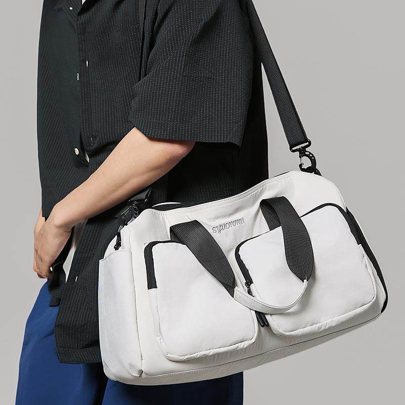 Portable independent bag, leisure travel bag, female messenger, large-capacity sports fitness bag, multi-pocket storage, luggage bag.