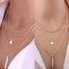 Three-line stick round pendant necklace in gold and silver