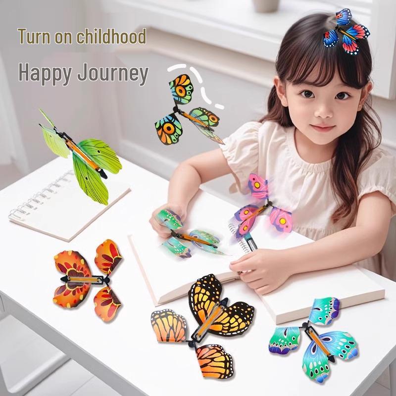 

Children s Outdoor Toy Set: Flying Butterfly, Spraying Flower, Boomerang & Bamboo Dragonfly for Parent-Child Fun