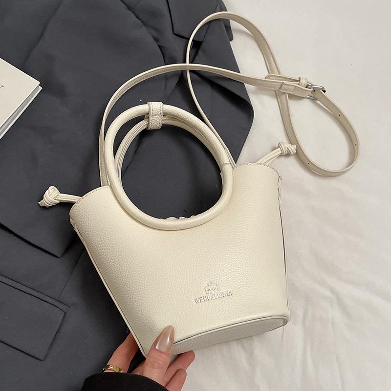 Spring and Summer Popular Korean Popular High-end Sense Portable Bucket Bag Temperament Casual Commuting Style Versatile Shoulder Messenger Bag