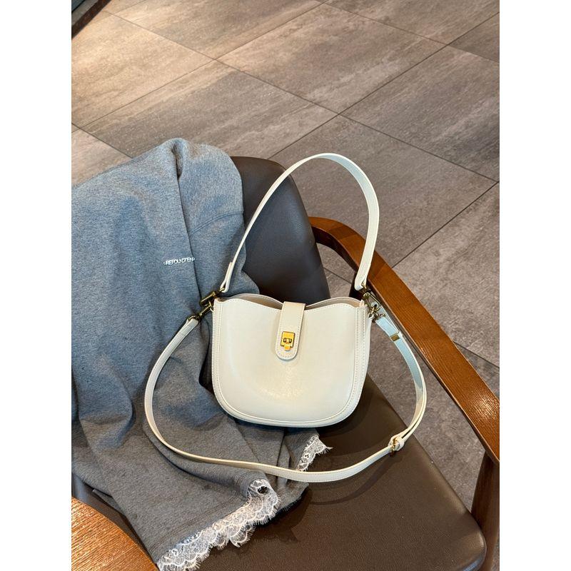 

Genuine Leather Saddle Bag Women s 2025 Spring/Summer New Arrival Western Style Underarm Bag Fancy Shoulder Bag Light Luxury Minority Messenger Bag Beige