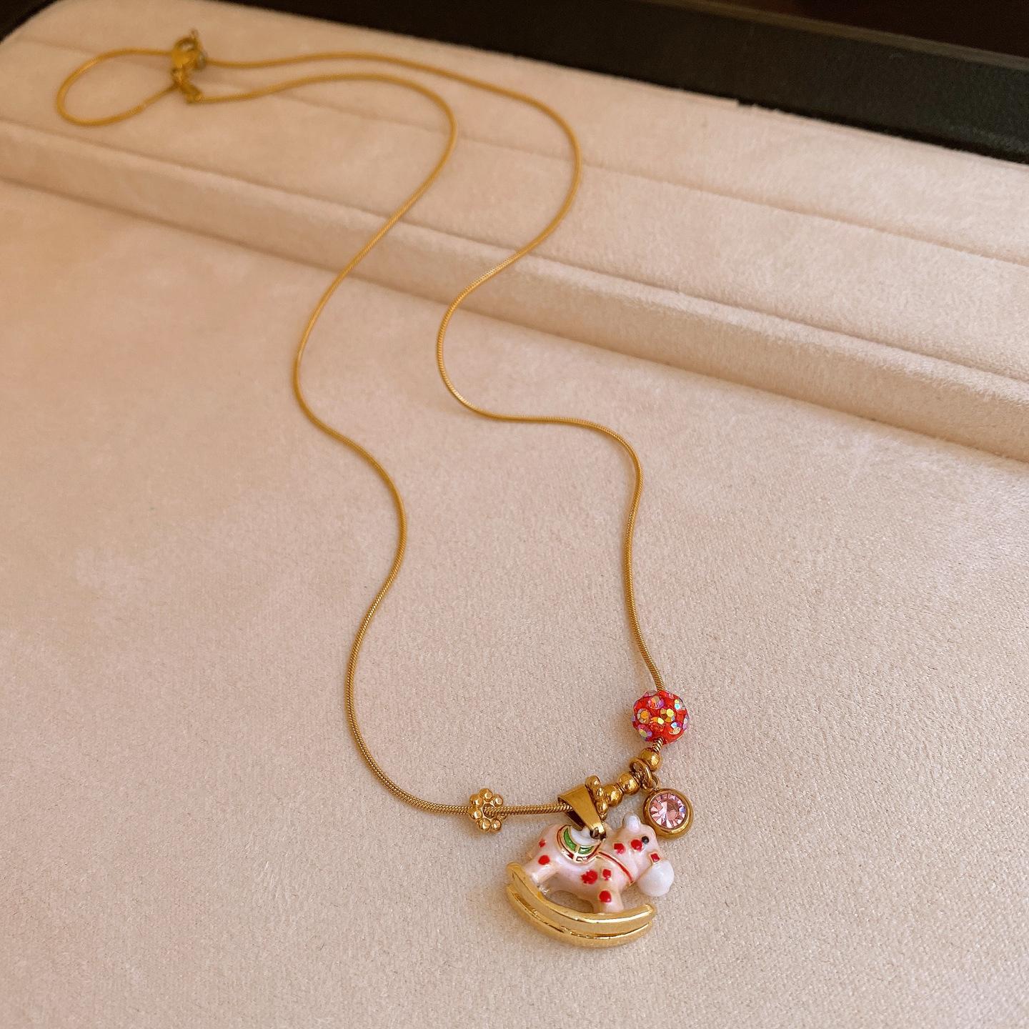 Stainless steel retro simple wind dripping oil natal year pony necklace women s sweater chain light luxury item decoration