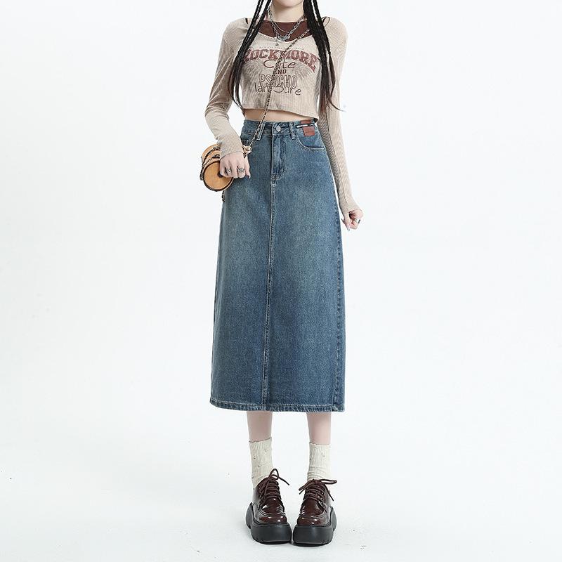 

Женская джинсовая миди-юбка с высокой талией, кожаной нашивкой и разрезом - Винтажная А-силуэта облегающая летняя мода. Large