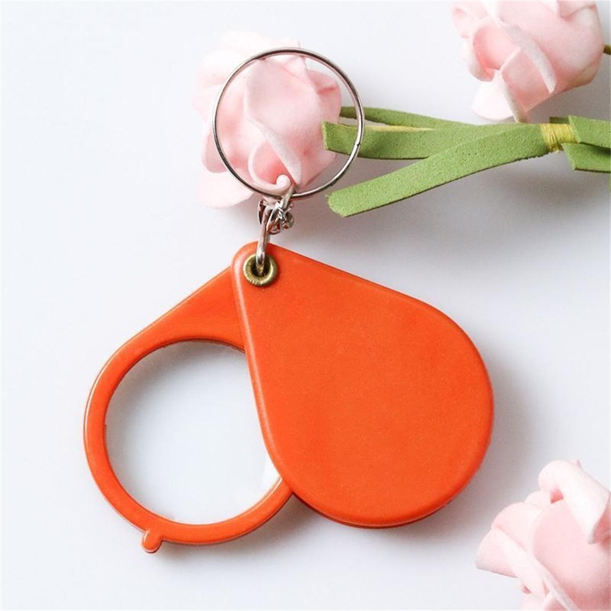 

Mini folding magnifying glass keychain portable high-definition multiples sperm magnifying glass for the elderly