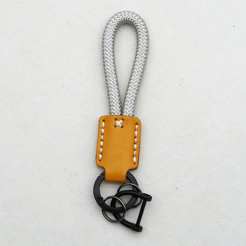 Hand-Woven Cowhide Leather Keychain Pendant with Logo Embossing - High-Quality Anti-Lost Car Lanyard