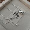Elegant Pull-Out Water Drop Necklace for Women - Fashionable, Versatile, and Simple Luxury Sweater Chain