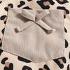 Euro-American Baby Long-Sleeve Set: Letter Bowknot Bodysuit, Leopard Bib Overalls, and Headband