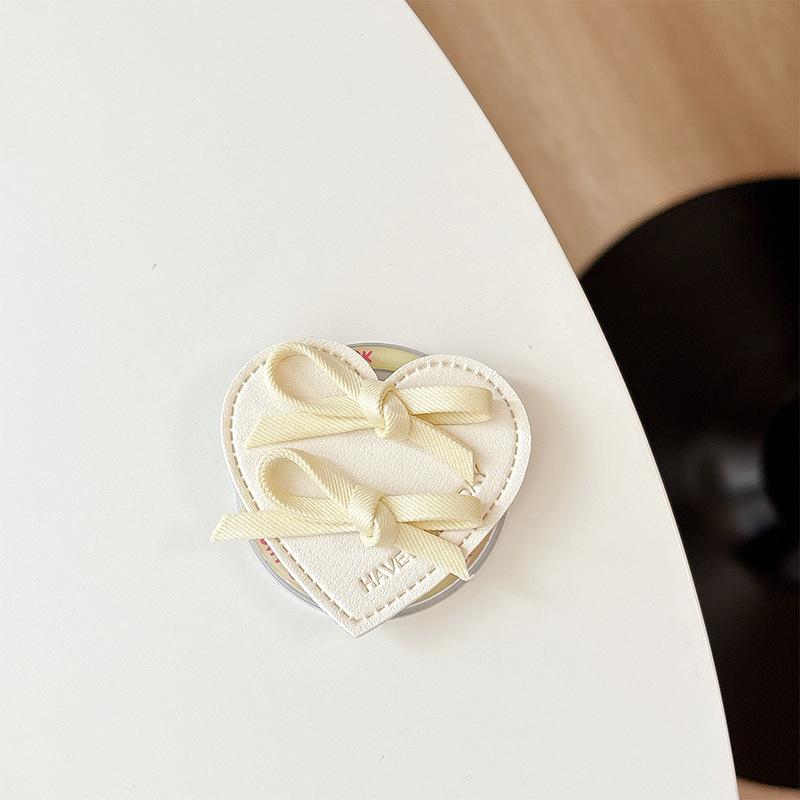 Bow Cortex Love Mobile Phone Airbag Bracket Magnetic Desktop Bracket Simple Niche