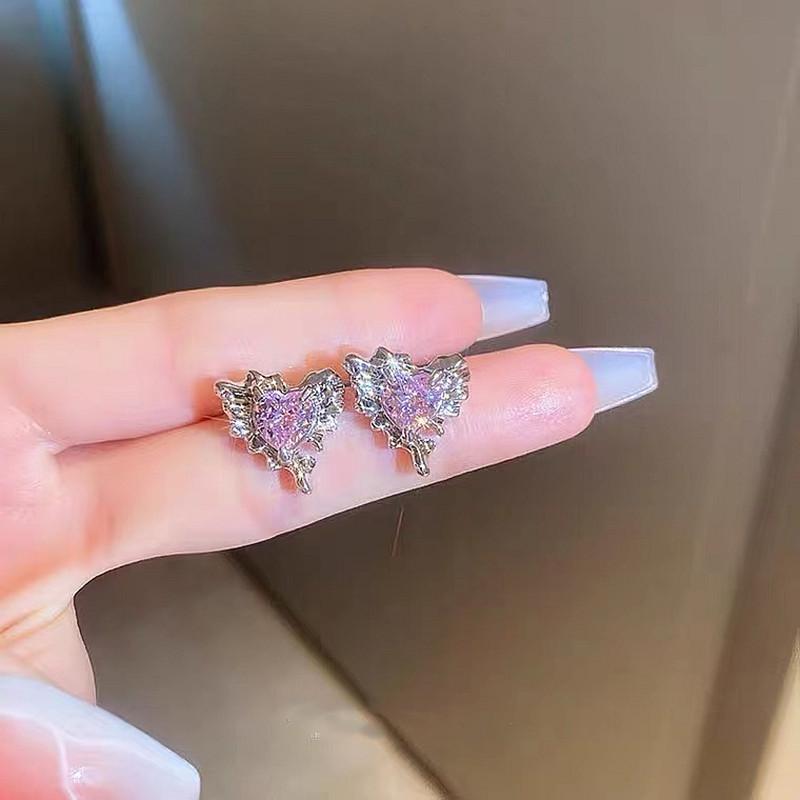 

Вишукані літні сережки-квіти з фіолетовими кристалами: Трендові, у формі серця, універсальні сережки-пусети