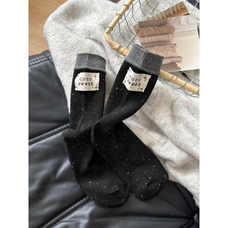 

Этот женский носок до середины икры на осень и зиму — модный и универсальный стиль с лоскутной надписью сзади у отверстия носка. 1 pair чёрный