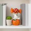 Whimsical Ghost Statue Halloween Figurine, Cute Sitting on Pumpkin Holding Candy Souvenir Gift Statue, Spooky Resin Table Ornament for Indoor