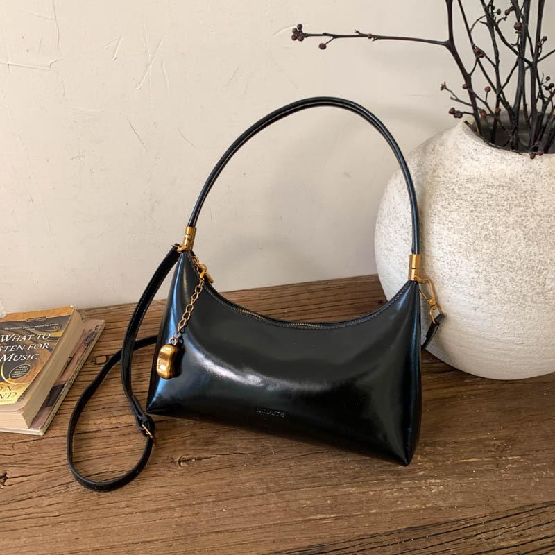 Autumn new high-value retro niche underarm atmosphere shoulder bag women's shopping commuter messenger bag bag