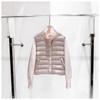 Autumn and winter new knitted stand-up collar splicing white duck down ribs down jacket women's short warm and light jacket