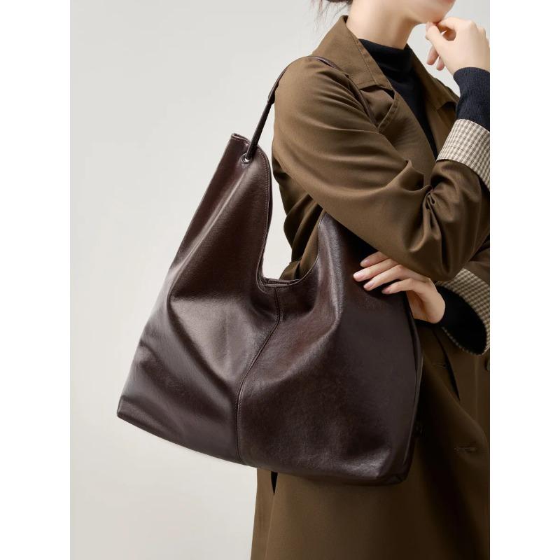 2026 New Vegetable Tanned Cowhide Popular Large Capacity Textured Tote Bag Versatile E Shoulder Class Underarm Commuting Bag