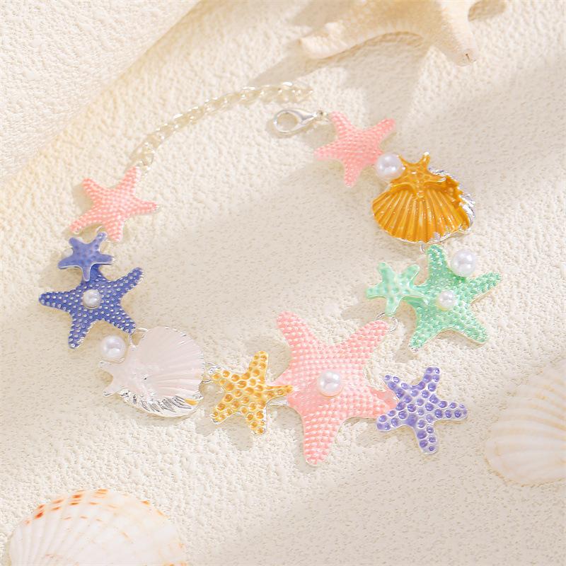 European and American star shell long necklace women's versatile high-end sense inlaid pearl drip oil collarbone chain necklace