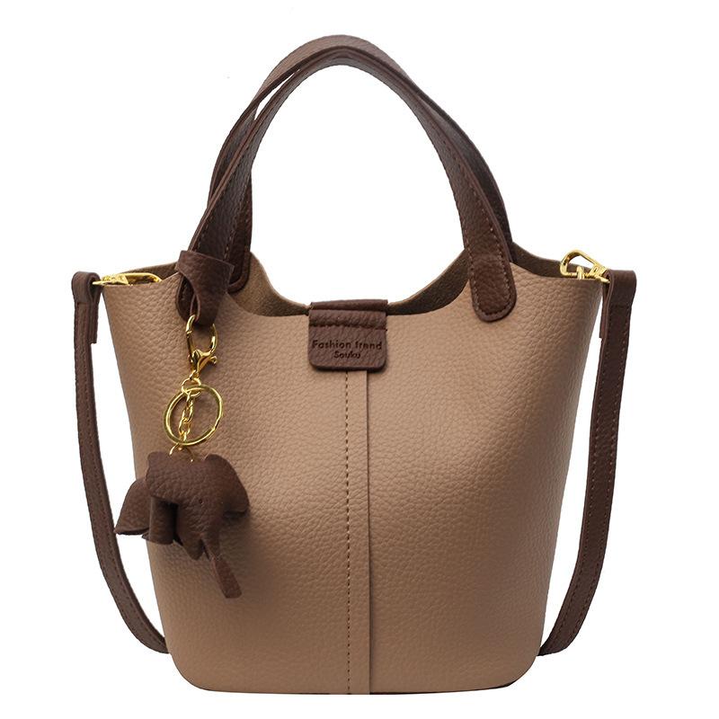 Damen PU-Leder Eimer Tasche Modisch Französisch Nische Designer Große Kapazität Vielseitig Pendler Crossbody Tasche Reise Tragetasche