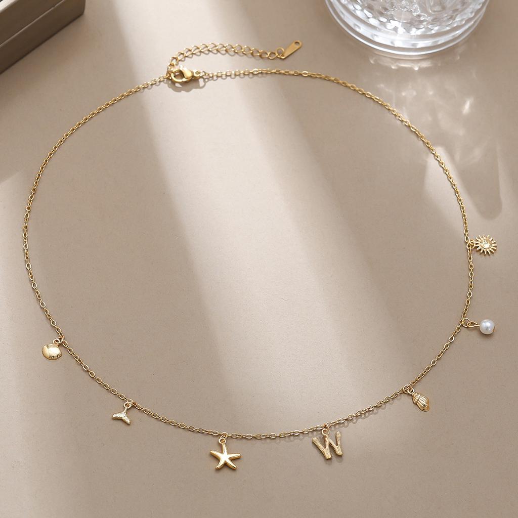 Einfache und modische Goldbuchstaben-Serie Meereskreaturen-Dekorationskette