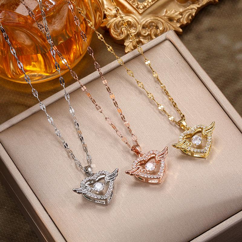 Dynamic Heart Titanium Steel Women's Necklace – Light Luxury Beating Heart Pendant with Versatile Strong Clavicle Chain.