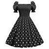 Damen-Retrokleid mit einzeiligem Kragen, umwickelter Brust und hoher Taille, gepunktet