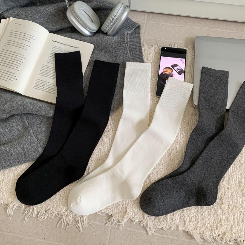 Basic solid color slim calf socks gentle wind soft waxy skin-friendly autumn and winter cotton socks Zhuji pure cotton women's medium tube socks