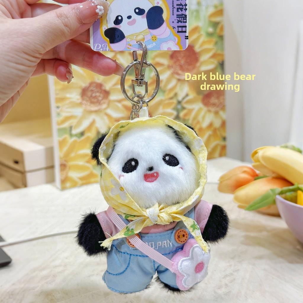 Sleutelhanger met panda-hoofddoek en pluche design, modieus voor kinderen en verzamelaars.