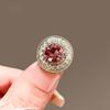 Vintage green diamond small round brooch high-end women's summer cardigan anti-light buckle pin mini small corsage accessories