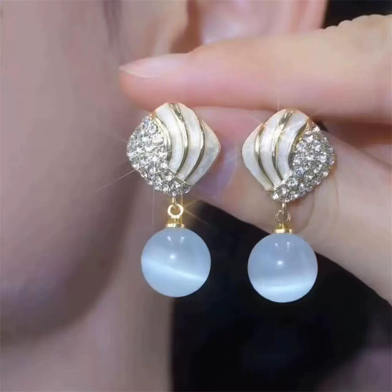 

Temperament full diamond-shaped opal earrings, new high-end versatile oil drip earrings, earrings.
