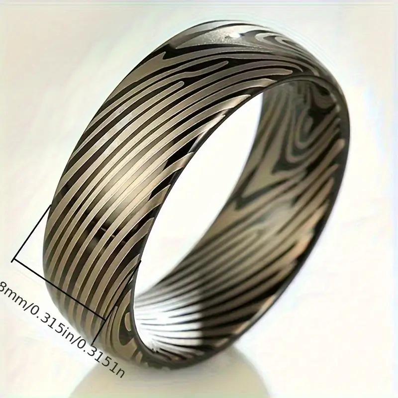 

Кольцо с текстурой дамасской стали 8 мм с узором роста для мужчин, 2024. Size 13 чёрный