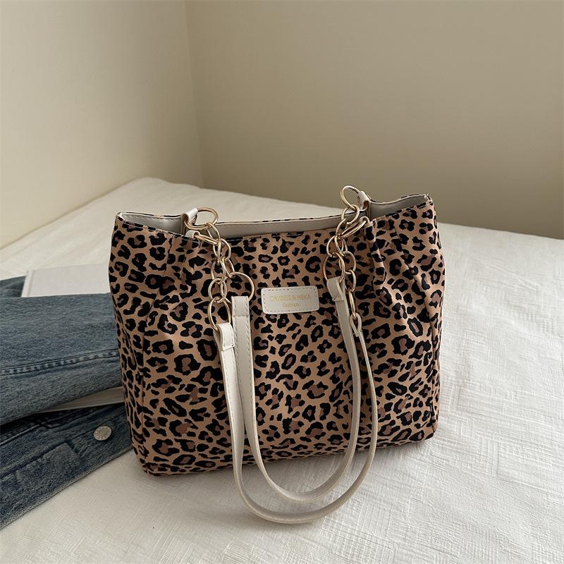 

Новая ручная большая вместительная персонализированная повседневная модная парусиновая женская сумка ручная сумка на плечо сумка-тоут цветной печати леопарда