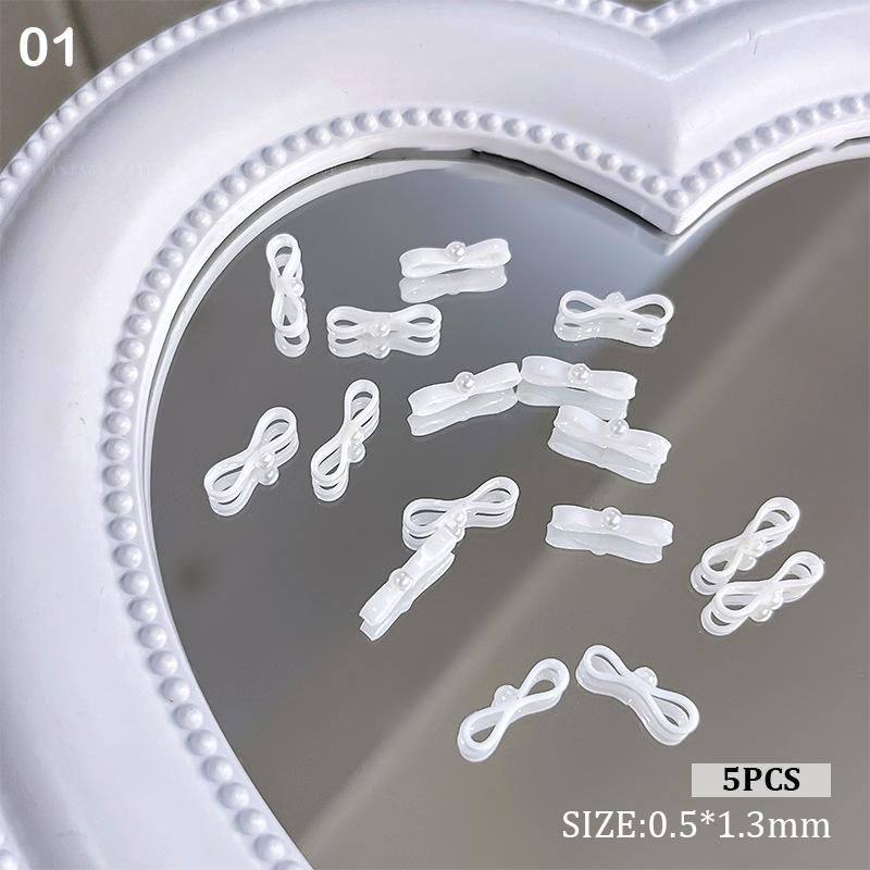 

5Pcs Ribbon Ballet Style Soft White Bow Nail Charms Parts Cute Ribbon Bow Pearl Nail Diy Nail Art Decor Accessories as the picture