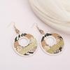 Women's Snakeskin Pattern Color Block Leather Earrings with Exaggerated Design and Round Hollow Water Drop Style