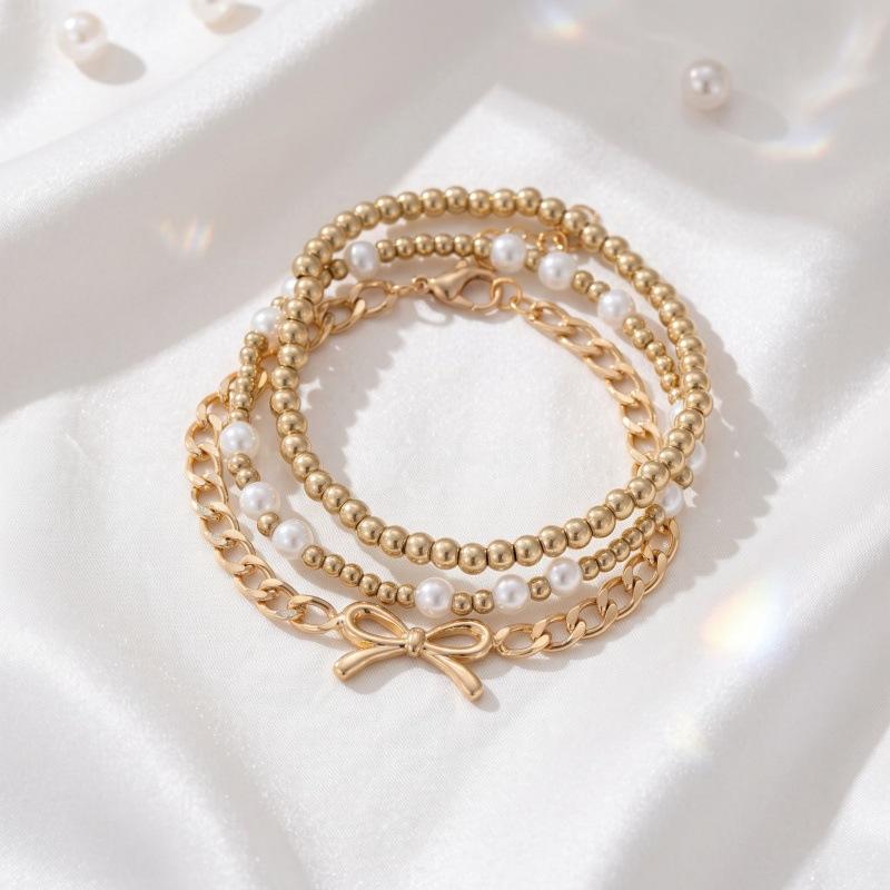 European and American simple bow pendant bracelet, fashionable and versatile imitation pearl star stacked hand jewelry women
