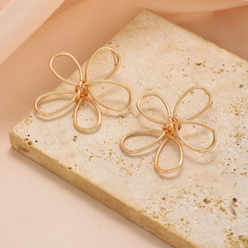 Flower earrings exaggerated design earrings women's electroplated alloy versatile hollow line woven stud earrings