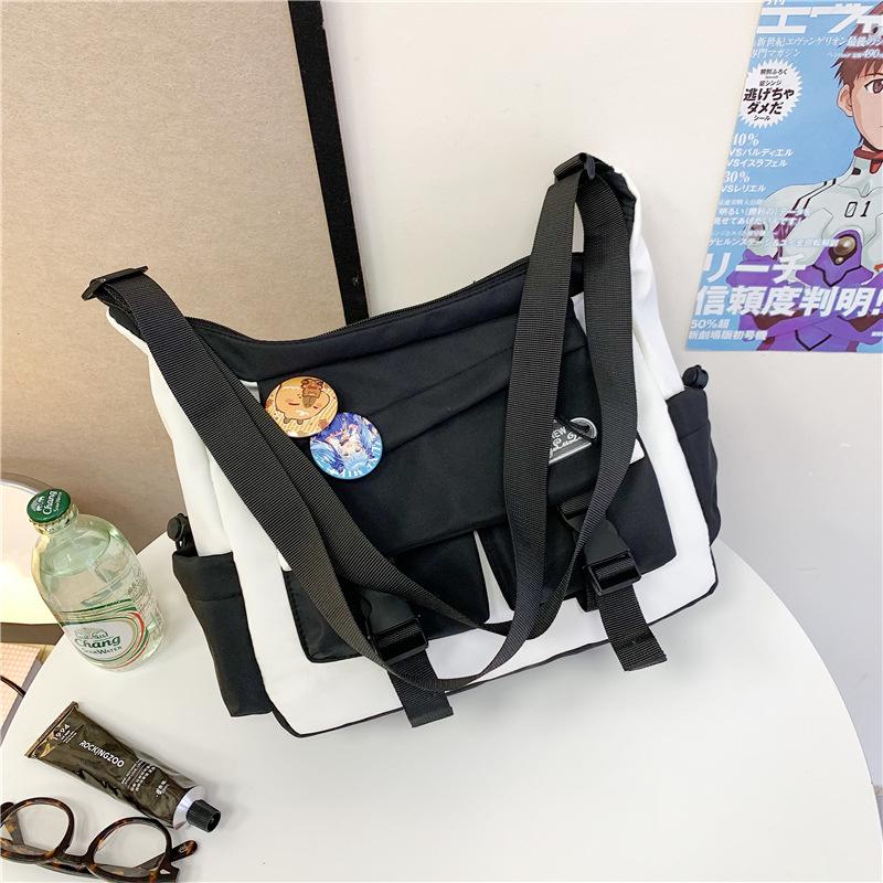Spring and summer new messenger bag men's trendy brand large capacity ins shoulder bag Japanese casual mailman bag versatile small satchel