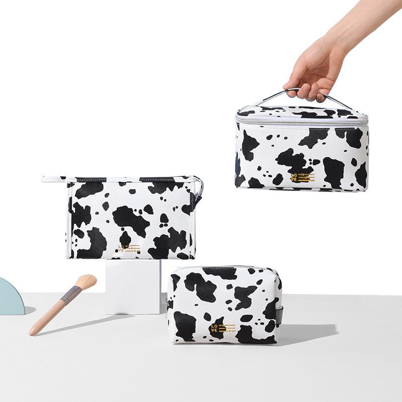 Cow Print Waterproof Cosmetic Travel Bag - Portable Skincare Organizer