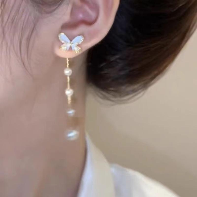 2023 New S925 Sterling Silver Pearl Bow Earrings with Long Tassel & Two-Way Butterfly Design