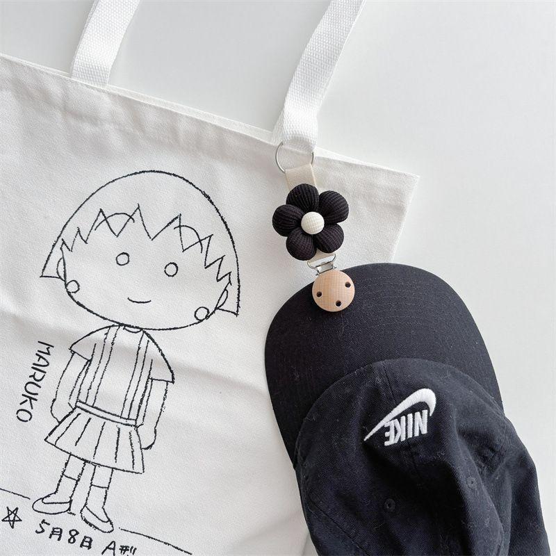 Reisetasche Blumenhutclip: Tragbarer Anti-Verlust-Sonnenhut-Anhänger