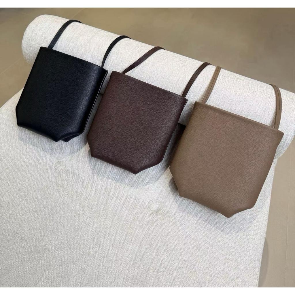 Row wind niche imported first-layer cowhide commuter mini bucket bag minimalist wind shoulder portable oblique span mobile phone bag