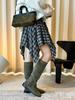 Xu Man Korean Retro Plaid Irregular Hem Tall Slimming Skirt for Women