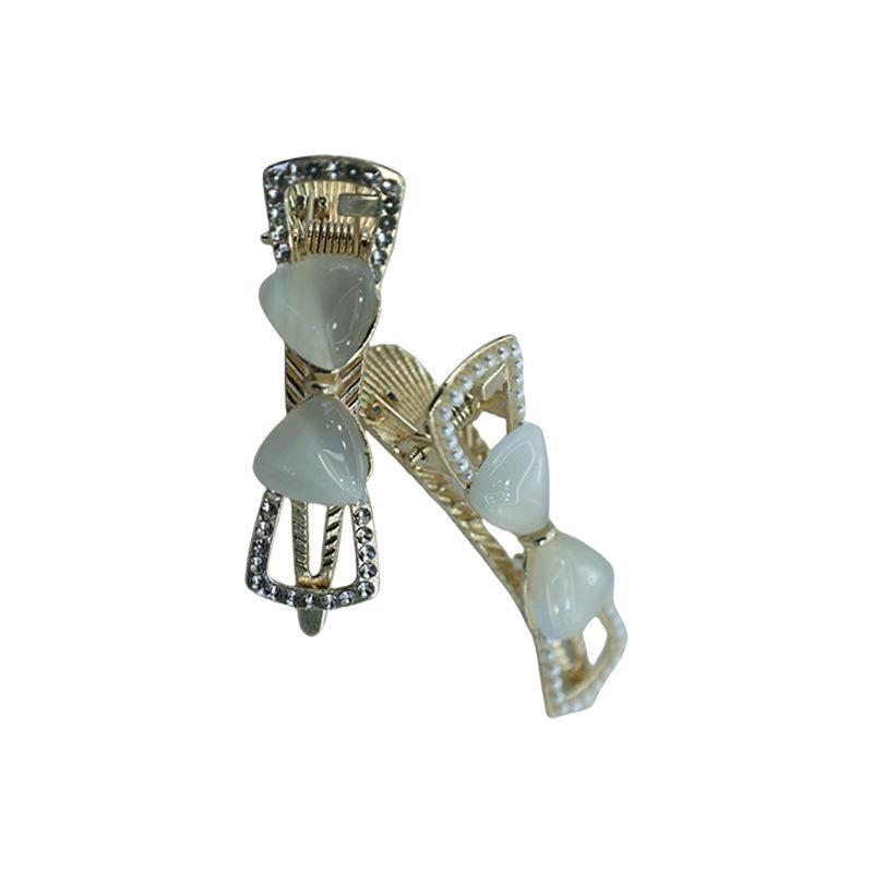 Cremefarbene Katzenaugen Schleife Haarspange - Retro Blume Hohl Damen Krallenclip Kopfschmuck Accessoire