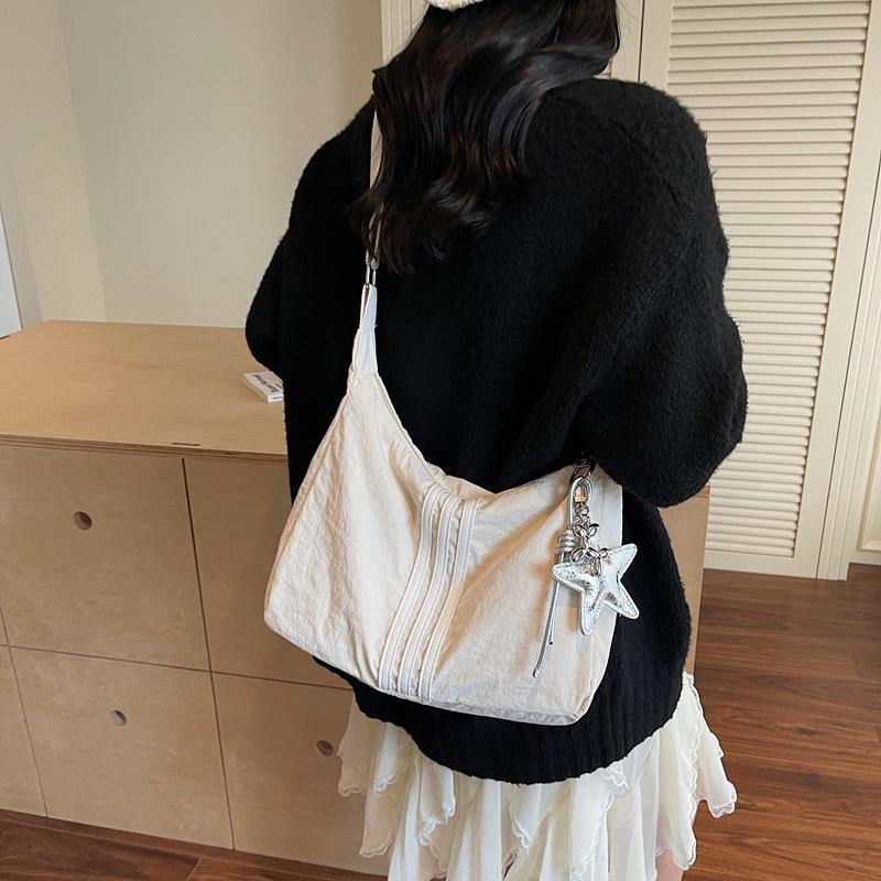 Korean version of fashion sports shoulder bag 2025 new casual lightweight large-capacity gym bag versatile striped crossbody bag