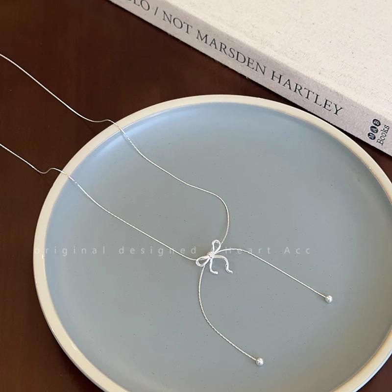 

Silver Bow Tassel Pull-Out Necklace: 2025 Trendy & Elegant Clavicle Chain