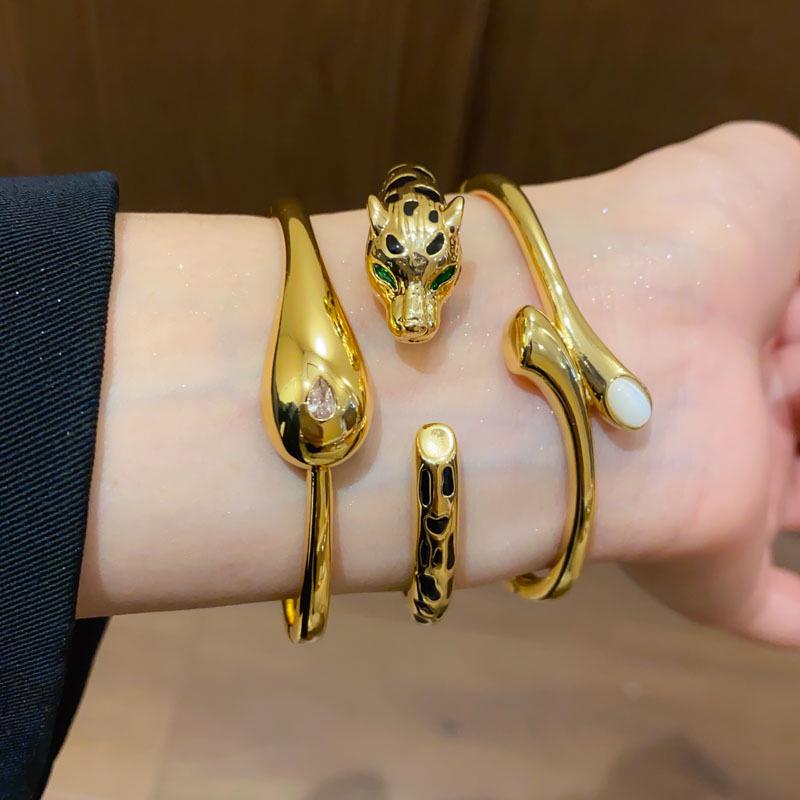 18K Goldplattiertes offenes ovales Crossover-Armreif - Leichter Luxus-Armband für Damen